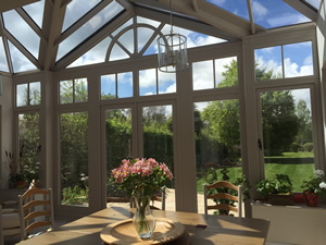 A high ceiling in an orangery /conservatory has many benefits