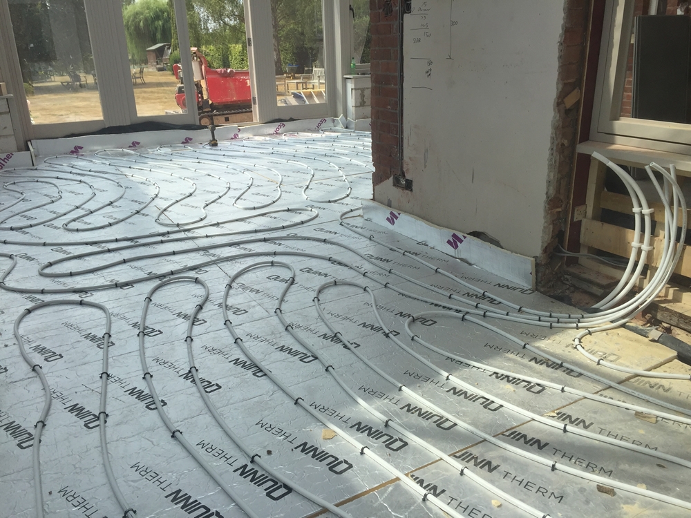 ORANGERY PROJECT STORY.  'Wet' underfloor heating pipes installed over the orangery floor insulation.