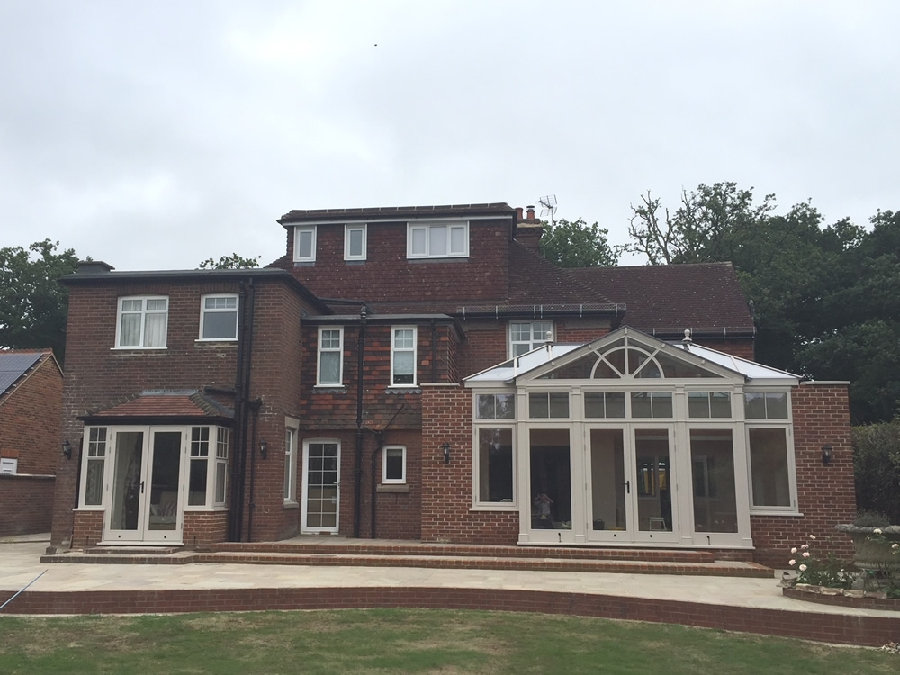 ORANGERY PROJECT STORY - Completed orangery and replacement kitchen door/window area to match and landscaping
